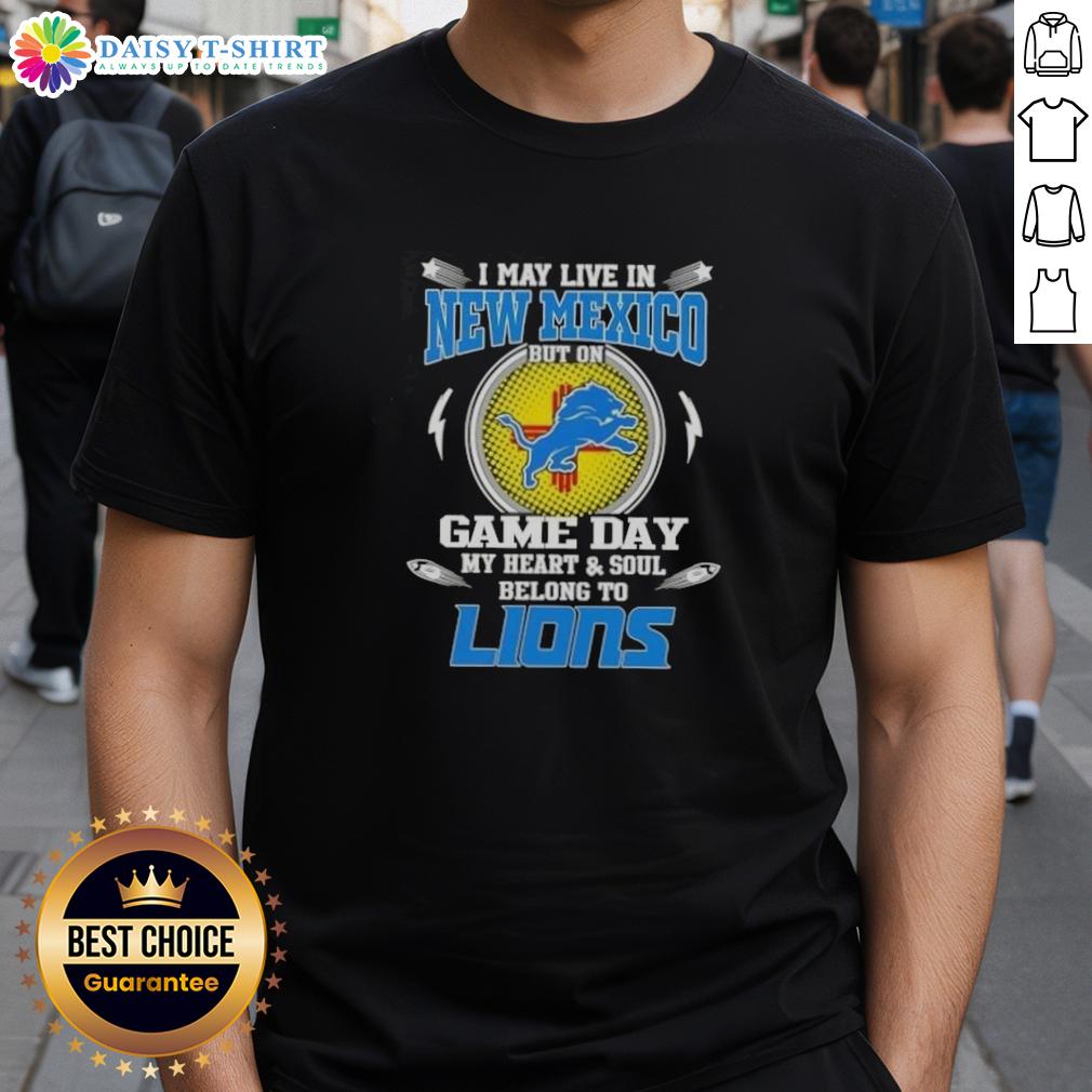 Alt Text: Detroit Lions T-shirt expressing loyalty, featuring 'I May Live In New Mexico But On Game Day My Heart Belongs To Detroit' design.