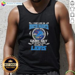Alt Text: Woman wearing Detroit Lions tank top, showcasing team spirit on game day in North Dakota.