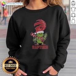Toronto Raptors Christmas Grinch Santa Hat sweatshirt for the 2025 holiday season, perfect for fans and festive cheer.
