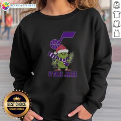 Nice Utah Jazz Christmas Grinch Santa Hat Holiday 2025 Sweatshirt design featuring festive colors and team logo.