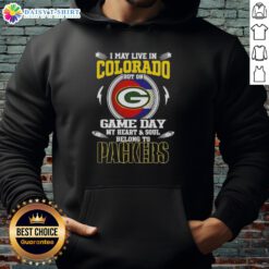 Alt Text: Green Bay Packers hoodie with text I May Live In Colorado But On Game Day My Heart Belongs To Green Bay Packers.