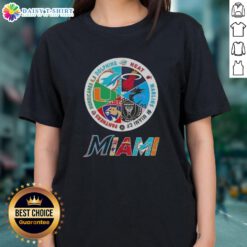 Alt Text: Official Miami all sports logos for Dolphins, Heat, Marlins, Miami FC, Panthers, and Hurricanes on a ladies tee.