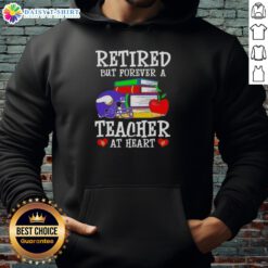 Alt Text: Official Minnesota Vikings hoodie for retired teachers, showcasing 'Retired But Forever A Teacher At Heart' design.