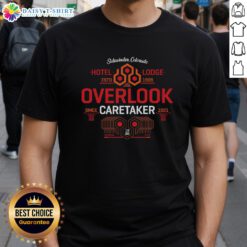 Alt Text: Official Shining Hotel Lodge T-Shirt, Estd 1909, featuring Overlook Caretaker design, perfect for fans of the classic film.