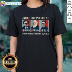 Official 'Unlike Our President' tee featuring Feynman, Darwin, and Tesla, celebrating great minds that embrace science and hope.