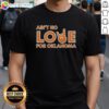 Alt Text: Original Ain't No Love For Oklahoma T-Shirt featuring bold graphic design, perfect for fans of Oklahoma pride and style.