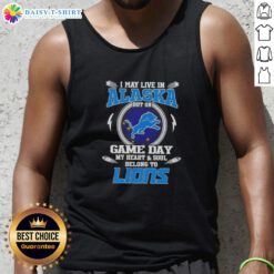 Woman wearing a Detroit Lions tank top with the phrase 'I May Live In Alaska But On Game Day My Heart Belongs To Detroit Lions'.