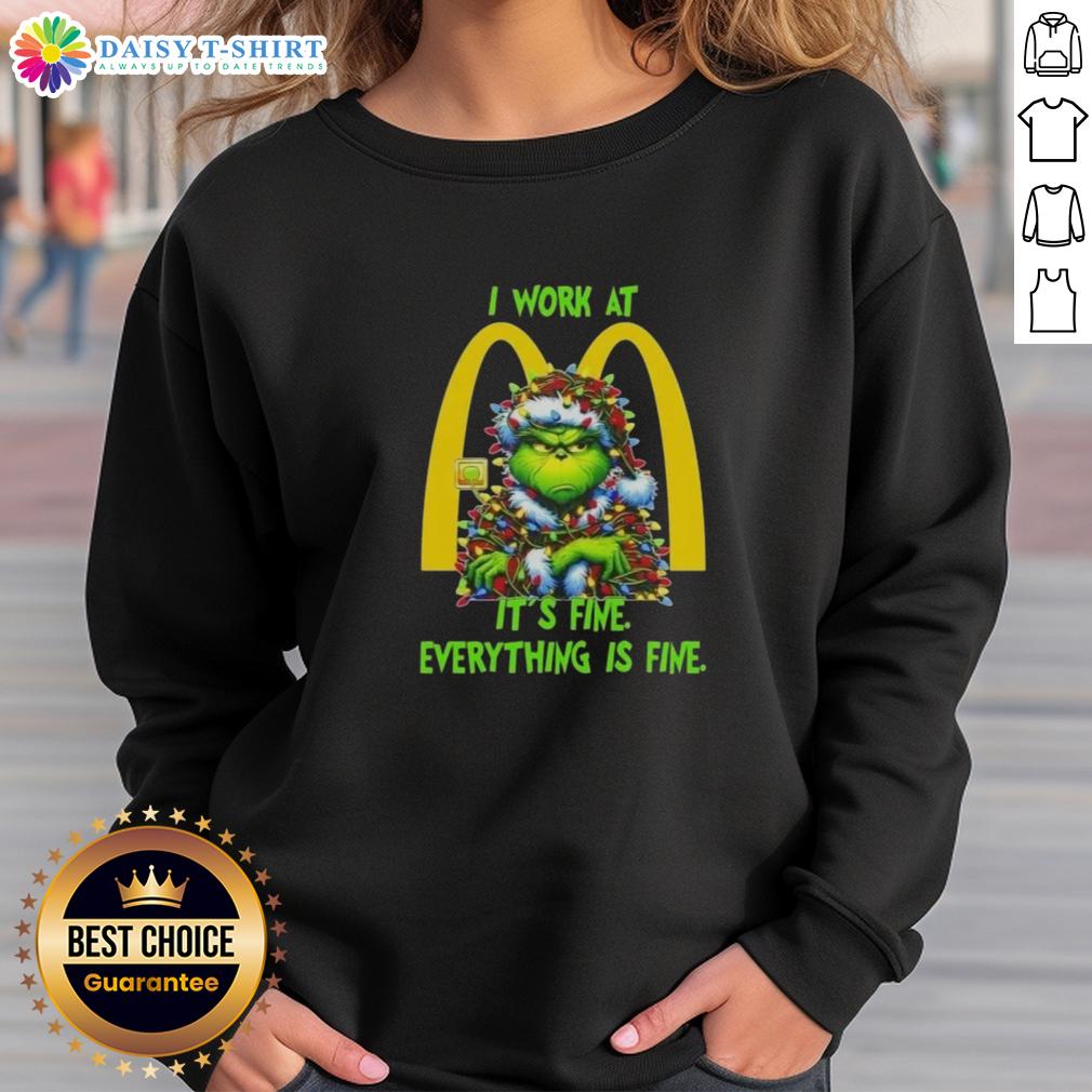Alt Text: Premium Grinch Christmas Tree sweatshirt featuring I work at McDonald's, it's fine, everything is fine design.