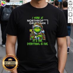 Premium Grinch Christmas Tree t-shirt featuring 'I Work At It's Fine Everything Is Fine' design by Northrop Grumman.