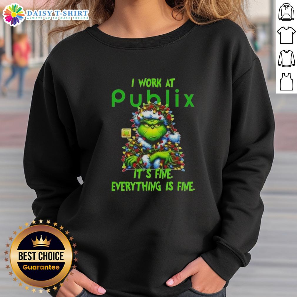 Alt Text: Premium Grinch Christmas Tree sweatshirt from Publix, featuring a festive design with the phrase It's fine, everything is fine.