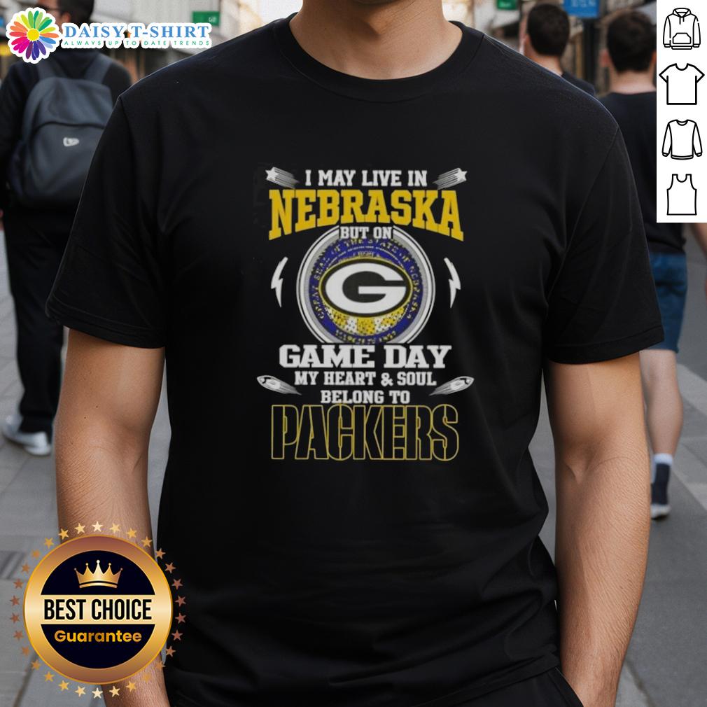 Game day t-shirt featuring 'I May Live In Nebraska But My Heart Belongs To Green Bay Packers' design.
