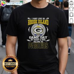 Green Bay Packers T-shirt with 'I May Live In Rhode Island But My Heart Belongs To Packers' slogan, perfect for game day.