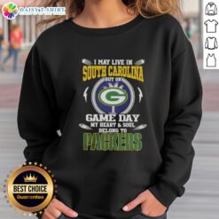 Green Bay Packers sweatshirt with 'I May Live In South Carolina But On Game Day My Heart Belongs To Packers' design.