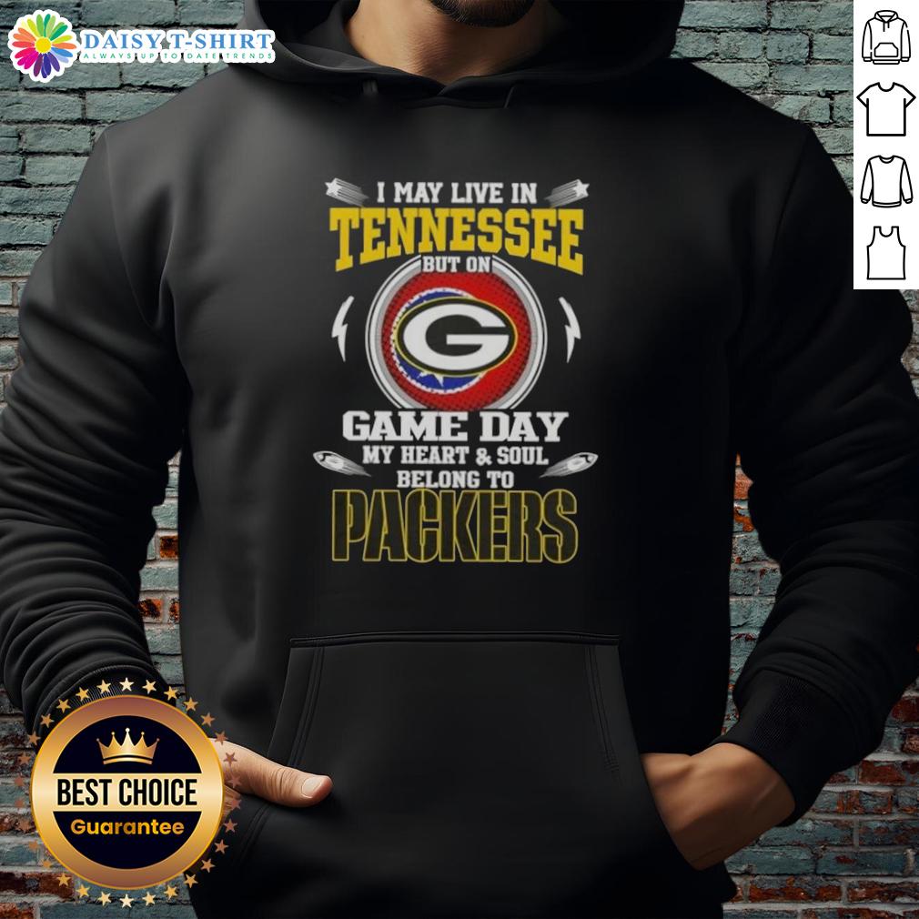 Green Bay Packers hoodie with 'I may live in Tennessee, but my heart belongs to the Packers' slogan on display.
