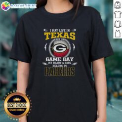 Green Bay Packers ladies tee featuring 'I May Live in Texas But My Heart Belongs to Green Bay Packers' design.