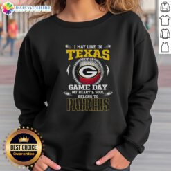 Green Bay Packers sweatshirt with the phrase 'I may live in Texas, but my heart belongs to the Packers' on display.