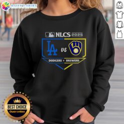 2025 NLCS matchup sweatshirt featuring Milwaukee Brewers vs Los Angeles Dodgers logo and vibrant team colors.