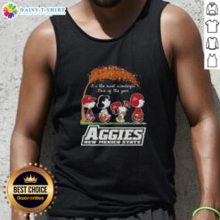 Alt Text: Top Peanuts Snoopy and Friends tank top featuring 'It's the Most Wonderful Time of the Year' design from Aggies New Mexico State.