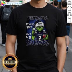 Awesome Grinch Santa Hat T-Shirt inspired by Seattle Seahawks - perfect for Christmas fans who love NFL humor.