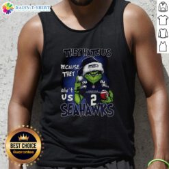 Awesome Grinch Santa Hat tank top for Seattle Seahawks fans, featuring 'They Hate Us Because They Ain't Us' design.