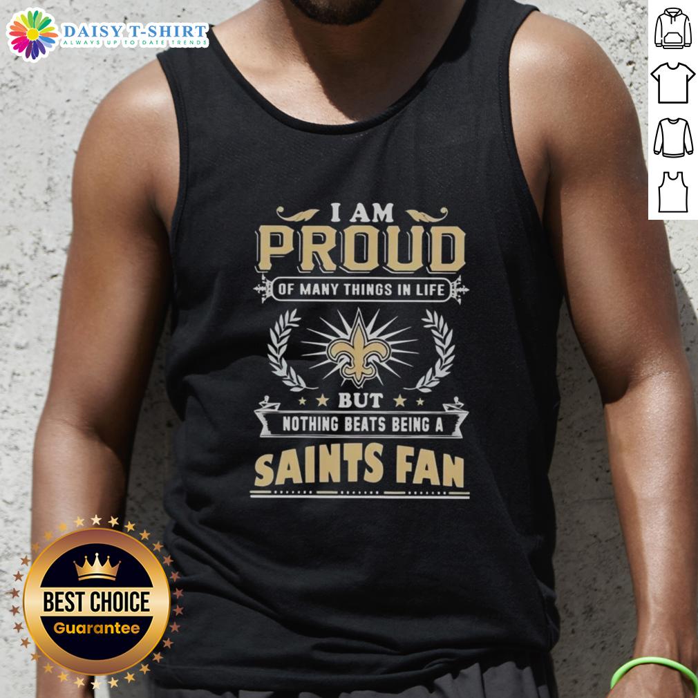 New Orleans Saints fan proudly wearing a tank top celebrating love for football and team spirit.