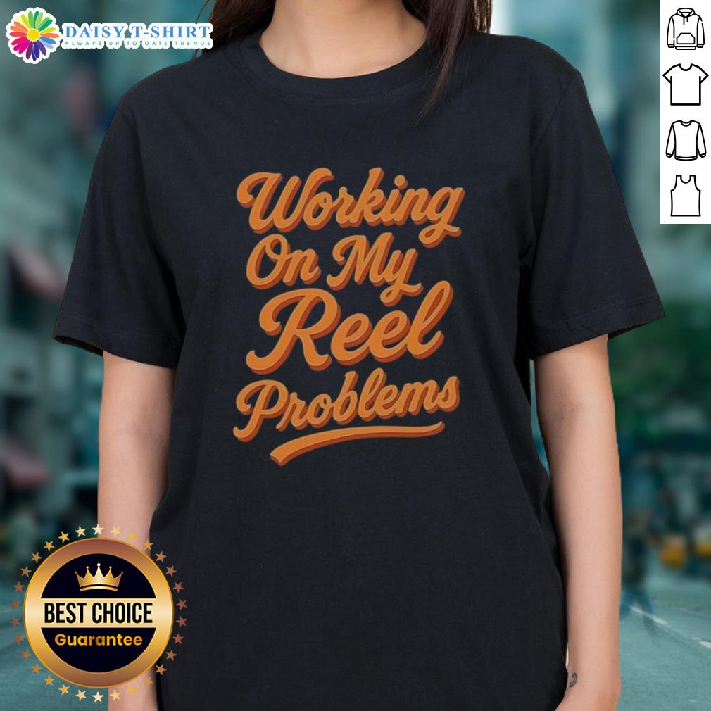 Fishing ladies tee with 'Awesome Working on My Reel Problems' design, perfect for fishing enthusiasts and casual wear.