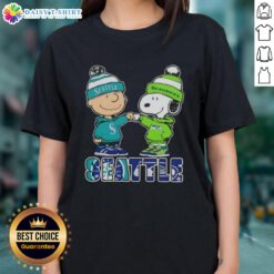 Adorable Charlie Brown fist bump with Snoopy, celebrating Seattle sports - Mariners & Seahawks ladies tee design.