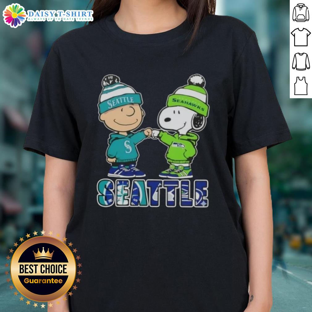 Adorable Charlie Brown fist bump with Snoopy, celebrating Seattle sports - Mariners & Seahawks ladies tee design.