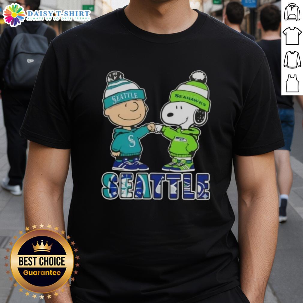 Alt Text: Cute Charlie Brown fist bump with Snoopy on Seattle sports T-shirt featuring Mariners and Seahawks design.