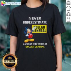 Empowering woman wearing a 'Never Underestimate a Dollar General Employee' tee at Dollar General store.