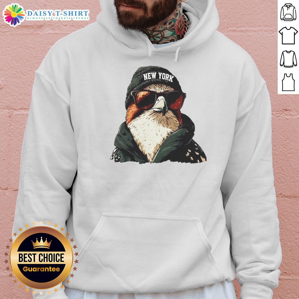Alt Text: New York Jets mascot in a beanie and sunglasses, sporting a hoodie, showcasing team spirit and fun.