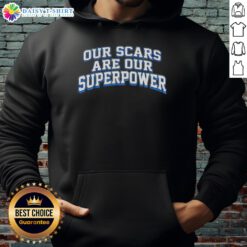 Good Our Scars Are Our Superpower Hoodie showcasing a stylish design promoting empowerment and resilience.