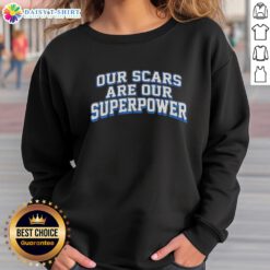 Alt Text: Good Our Scars Are Our Superpower sweatshirt in vibrant colors, promoting self-acceptance and resilience.