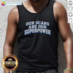 Alt Text: Model wearing 'Good Our Scars Are Our Superpower' tank top, showcasing a confident, empowering message on body positivity.