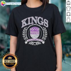 Alt Text: Sacramento Kings National Basketball Association crest on a stylish ladies tee, perfect for any basketball fan.