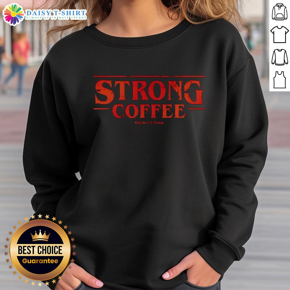 Good Strong Coffee X Stranger Things sweatshirt featuring iconic graphics, perfect for fans of the hit series.