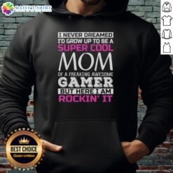 Happy mom in a gamer hoodie, proudly showcasing her love for gaming and motherhood with 'Super Cool Mom' slogan.