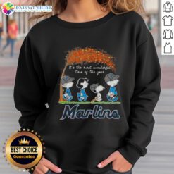 Happy Miami Marlins X Peanuts Snoopy and Friends sweatshirt for autumn, celebrating the most wonderful time of the year.