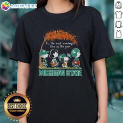 Happy Michigan State Spartans tee featuring Snoopy and friends, perfect for autumn and celebrating the season.