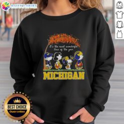 Happy Michigan Wolverines sweatshirt featuring Snoopy and friends, perfect for autumn and celebrating the season.