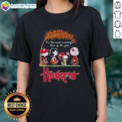 Happy Nebraska Cornhuskers tee featuring Snoopy and friends celebrating autumn, perfect for the most wonderful time of the year.