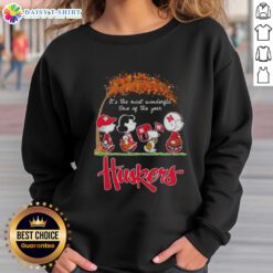 Happy Nebraska Cornhuskers sweatshirt featuring Snoopy and friends, perfect for autumn and celebrating the season.