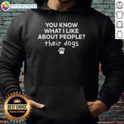 Happy person wearing a 'You Know What I Like About People? Their Dogs!' hoodie, showcasing love for dogs and humor.