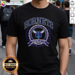 Alt Text: Retro Charlotte Hornets NBA logo T-shirt featuring a laurel wreath frame, perfect for basketball fans.