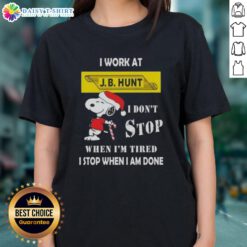 Alt Text: Christmas Ladies Tee featuring Snoopy with 'I work at J.B. Hunt. I don't stop when I'm tired, I stop when I'm done.'