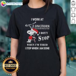 Cute Snoopy graphic on a ladies tee, featuring 'I work at Longhorn Steakhouse' and motivational quote for Christmas.
