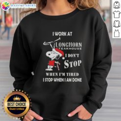 Snoopy Christmas sweatshirt for Longhorn Steakhouse featuring 'I don't stop when I'm tired, I stop when I'm done' quote.