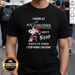Funny Snoopy graphic on Christmas T-shirt for Longhorn Steakhouse, saying 'I dont stop when Im tired, I stop when Im done.'