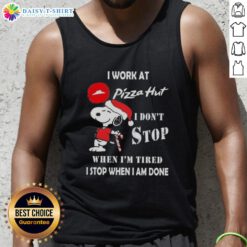 Alt Text: Snoopy wearing a Christmas tank top with the phrase I work at Pizza Hut, I don't stop when I'm tired printed.