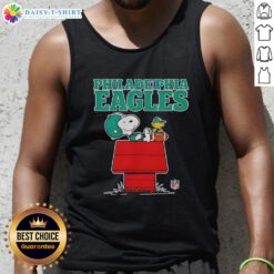 Official Philadelphia Eagles Snoopy tank top in Peanuts style, featuring Snoopy relaxing with a football.